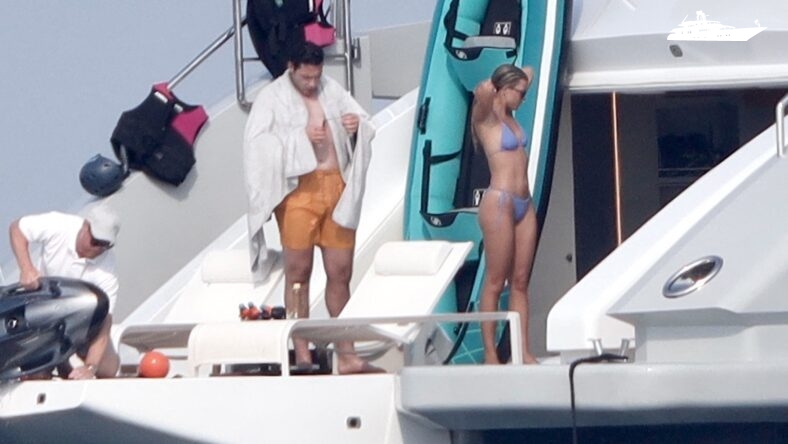 Sofia Richie and Elliot Grainge are seen rinsing off on the back of their luxury yacht after playing around in the ocean in St Tropez.
