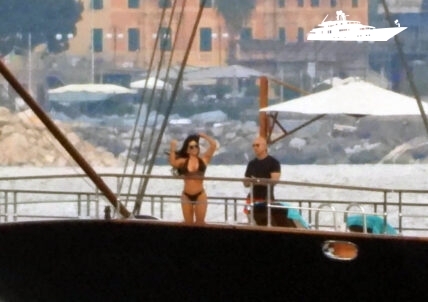 Jeff Bezos is seen taking photos of Lauren Sanchez on their yacht, while at anchor in Portofino